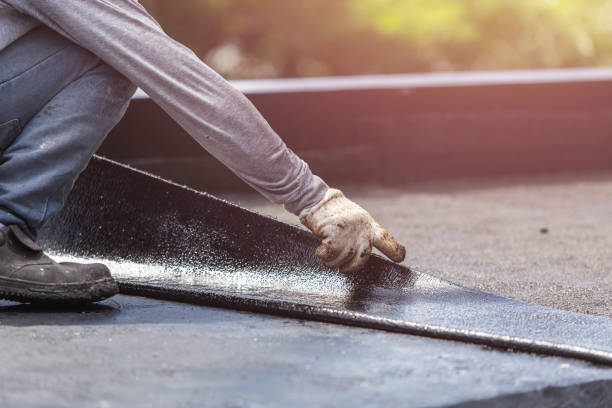 Professional Basement Waterproofing technician working in Minneapolis, KS